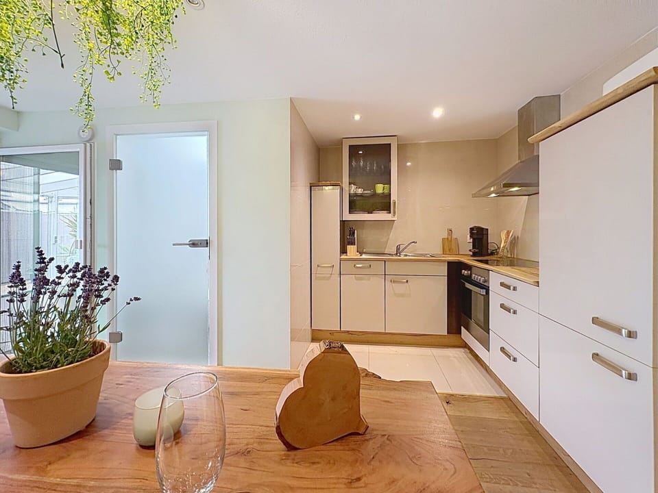 Furniture, Interior Design, Flooring, Floor, Wall, Countertop, Wood, Ceiling, Room, Cabinetry