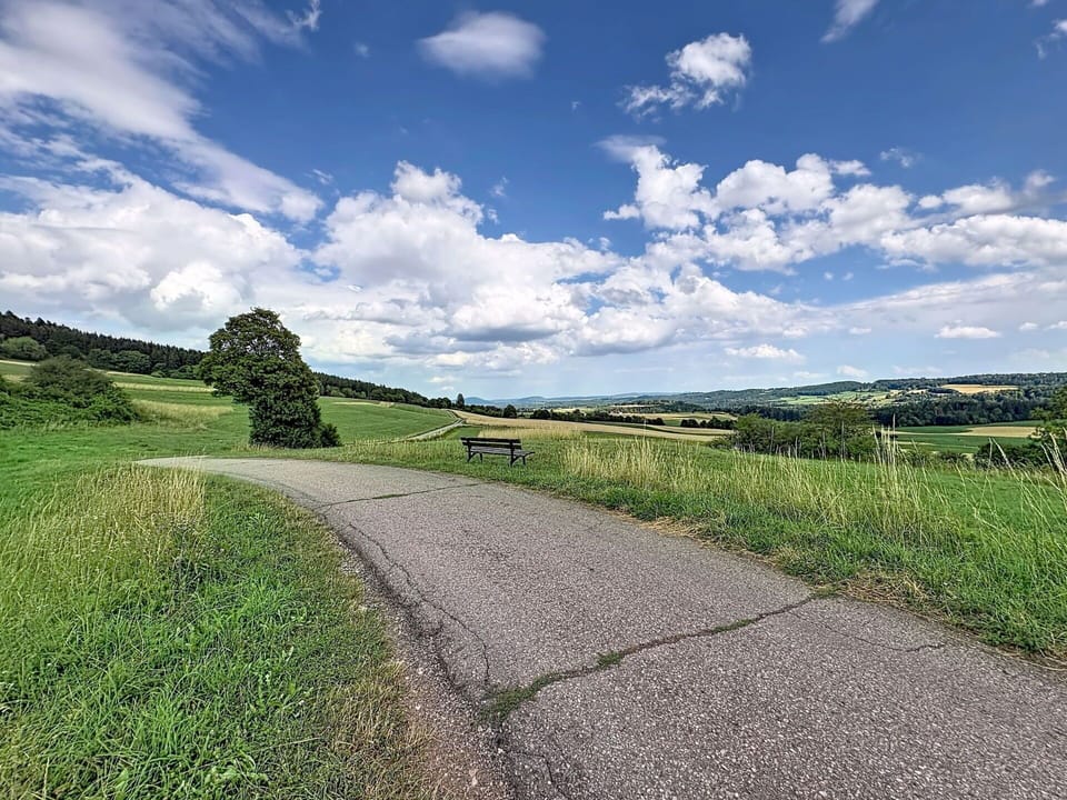 Sky, Blue, Green, Grass, Cloud, Road, Natural Landscape, Road Surface, Grassland