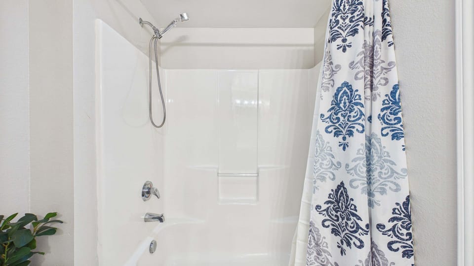 Master bathroom with shower and tub combo