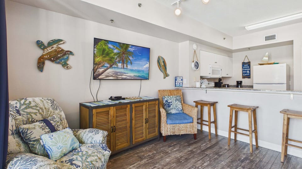 Huge TV in living area is perfect for vacation