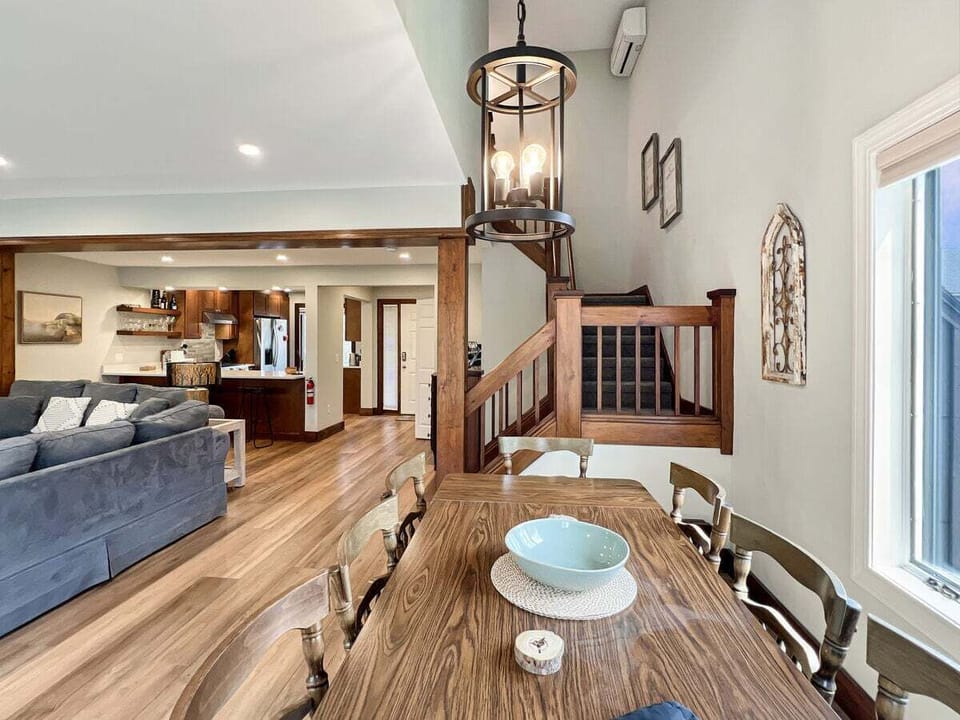 Dining table with 8 seats and stair to second level