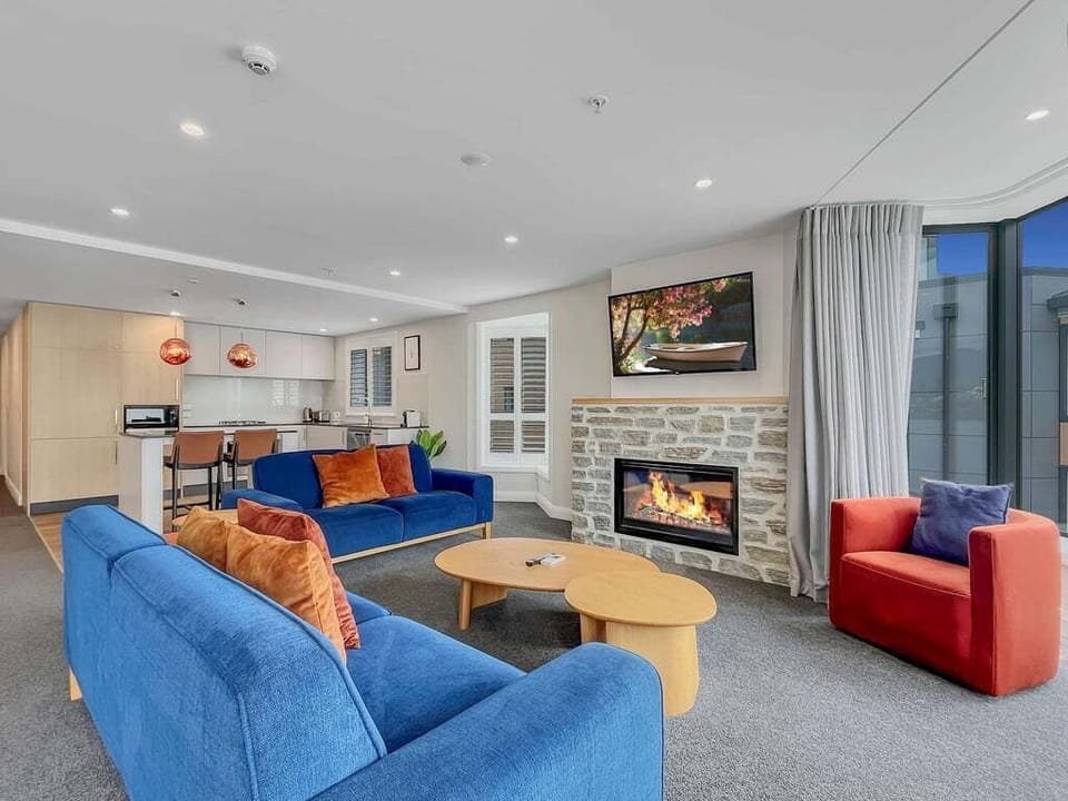 Open-plan living seamlessly connects the lounge, dining, and kitchen, creating a welcoming space for family and friends.