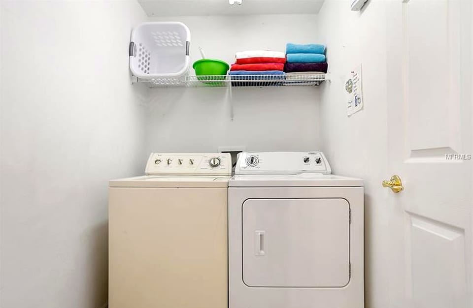 Convenient in-home washer/dryer with organized laundry storage