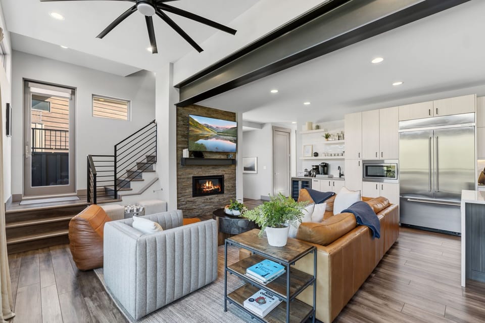 The Heart of the Home -
The great room connects the kitchen and dining areas, creating a comfortable central space for the entire group.