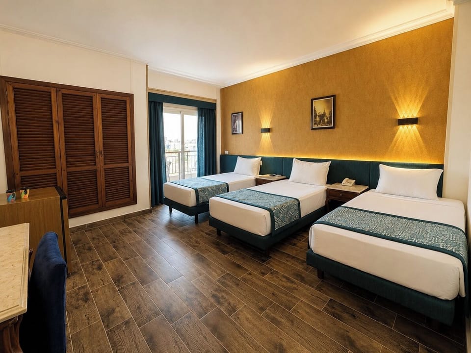 Triple Room | 1 bedroom, minibar, soundproofing, bed sheets