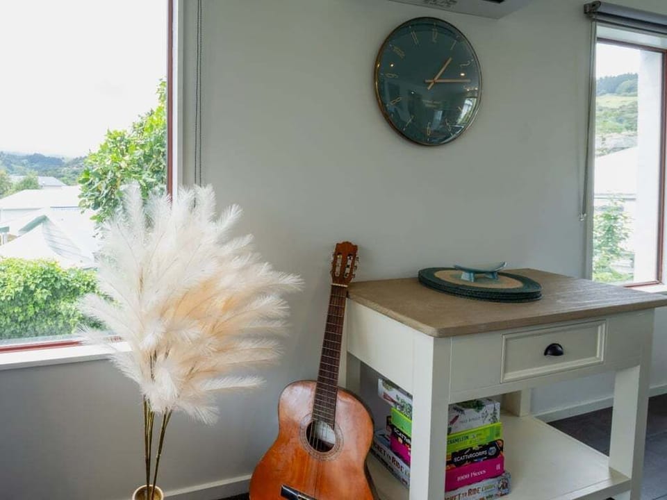 A comfortable, sun-filled lounge perfect for lazy mornings, family time, and easy evenings in