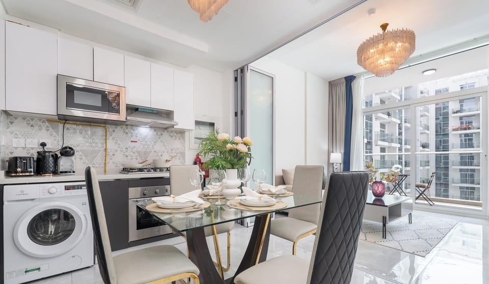 Deluxe Apartment, Balcony, City View | Private kitchen | Electric kettle, toaster, freezer, dining table