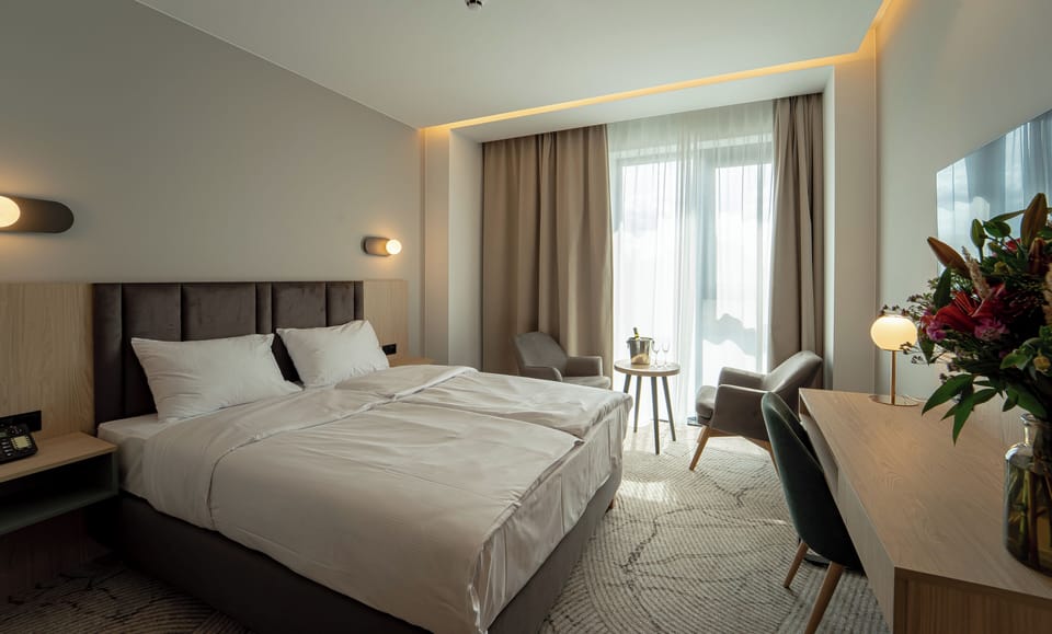 Standard Double Room | In-room safe, desk, laptop workspace, blackout drapes