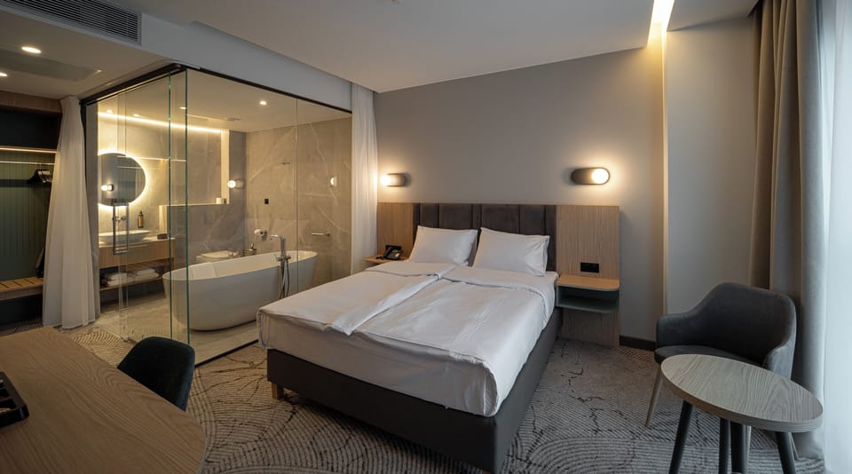Executive Apartment, City View | In-room safe, desk, laptop workspace, blackout drapes