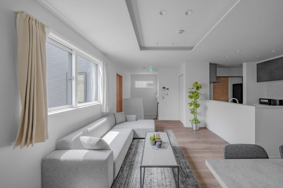 Apartment | Living area | 50-inch flat-screen TV with digital channels