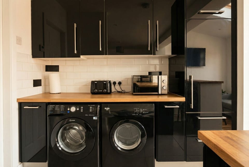 Washer, dryer, microwave and toaster all included so longer stays feel completely effortless.