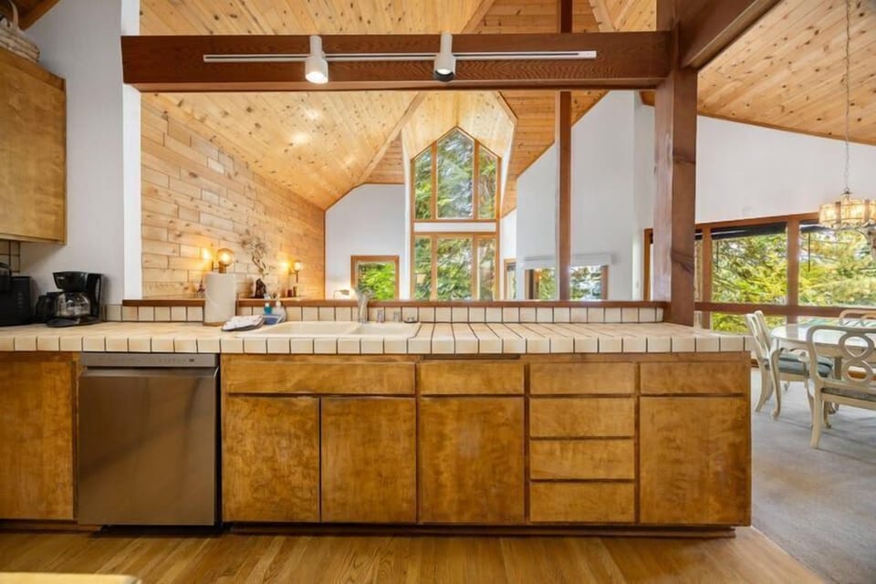 Cook, dine, and connect in this open-concept kitchen and dining area