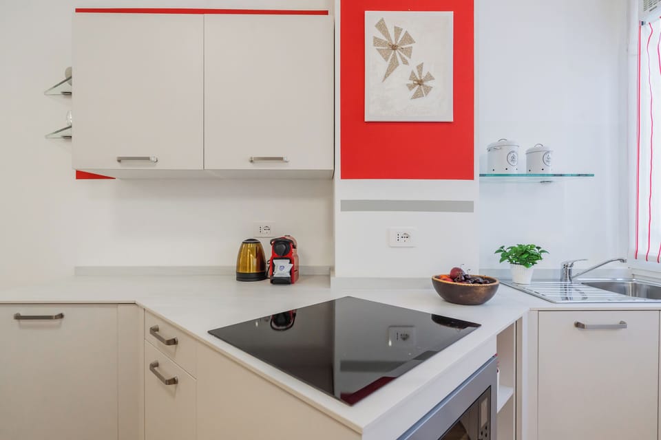 Coffee/tea maker, fridge, stovetop, dishwasher