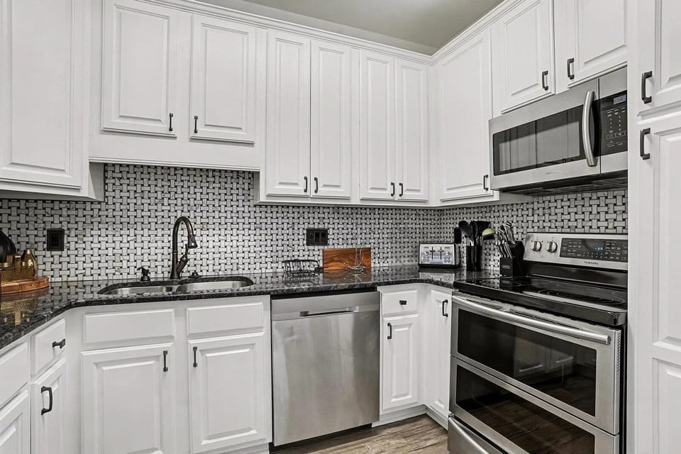 Cook with ease — electric stove, microwave, air fryer, and full cookware provided