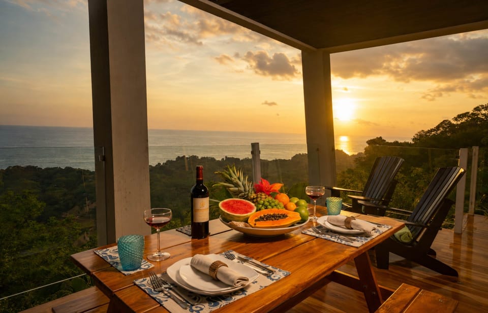 Sunset dining with tropical fruit, fine wine and sweeping views across the Pacific Ocean