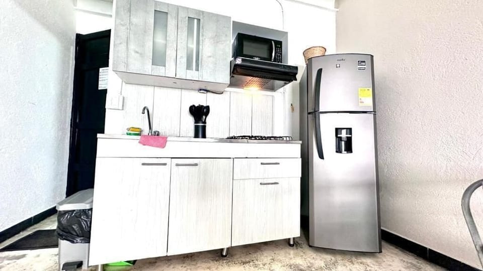 Fridge, microwave, cookware/dishes/utensils