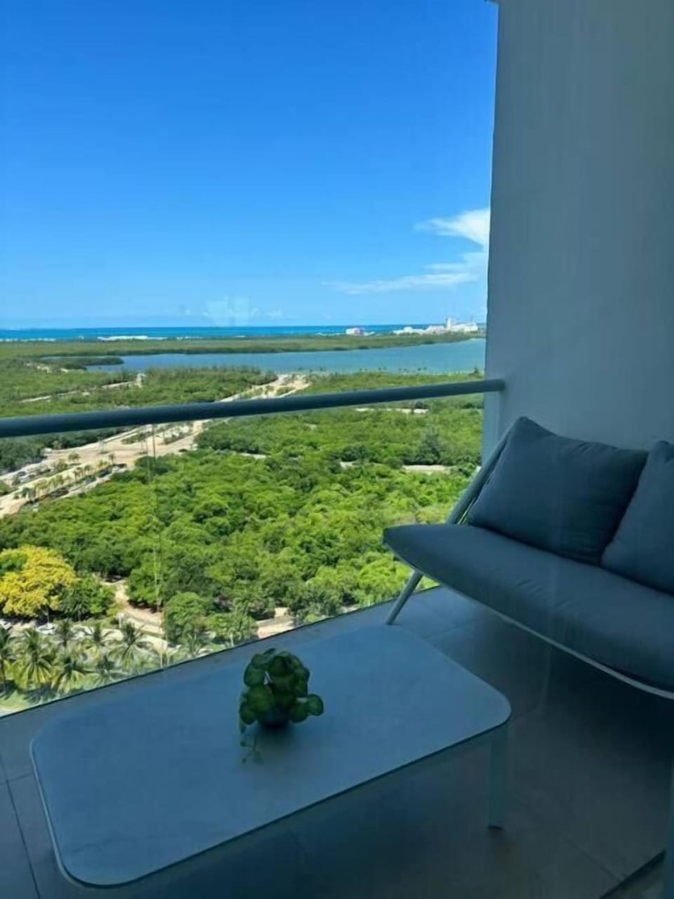 Deluxe Apartment, Balcony, Beach View | Property grounds
