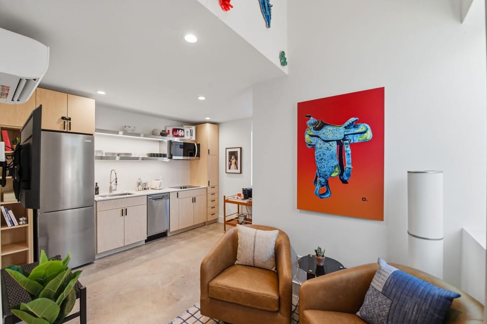 A stylish living space with designer finishes and a smart TV for movie nights and game day. Plenty of room to spread out and settle in.