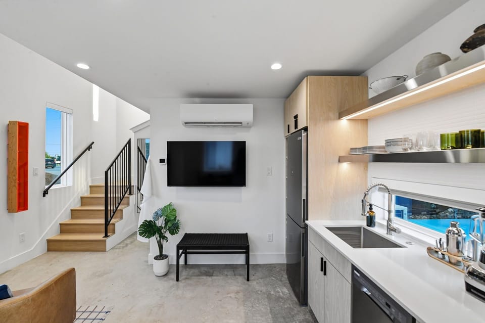 A stylish living space with designer finishes and a smart TV for movie nights and game day. Plenty of room to spread out and settle in.
