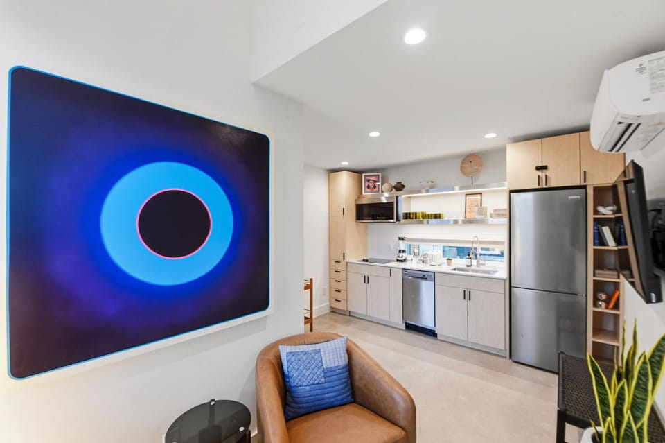 A stylish living space with designer finishes and a smart TV for movie nights and game day. Plenty of room to spread out and settle in.
