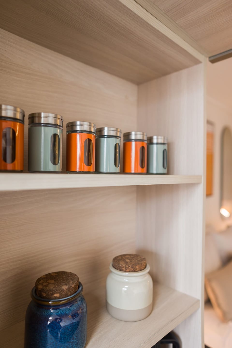 Stylish and colorful canisters add a touch of charm to your stay, perfect for organizing essentials.