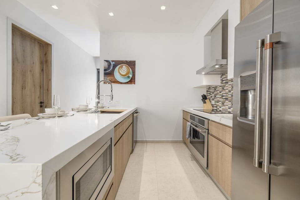 Modern kitchen with everything you need to prepare meals, snacks, and morning coffee during your stay.
