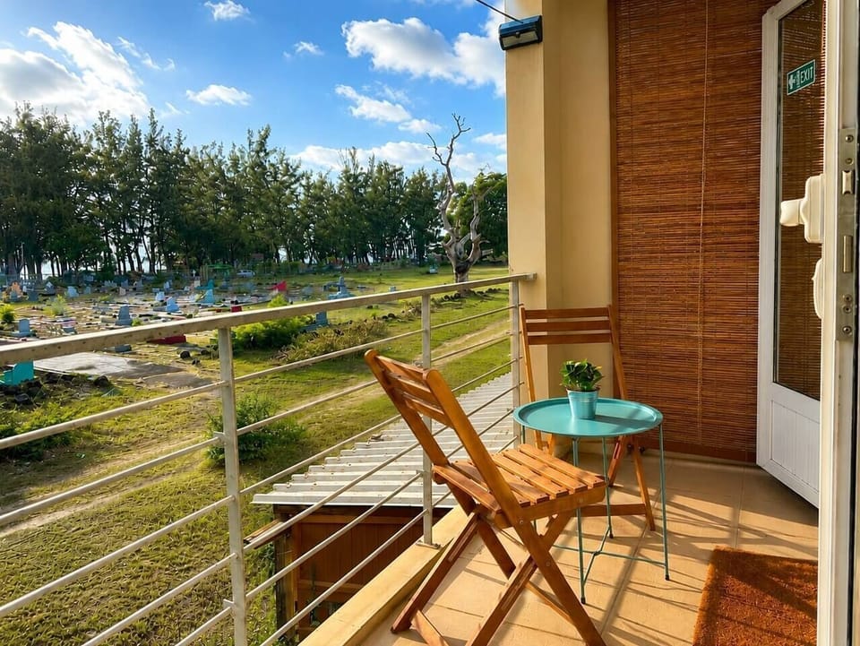 Furnished balcony overlooking the quiet surroundings.