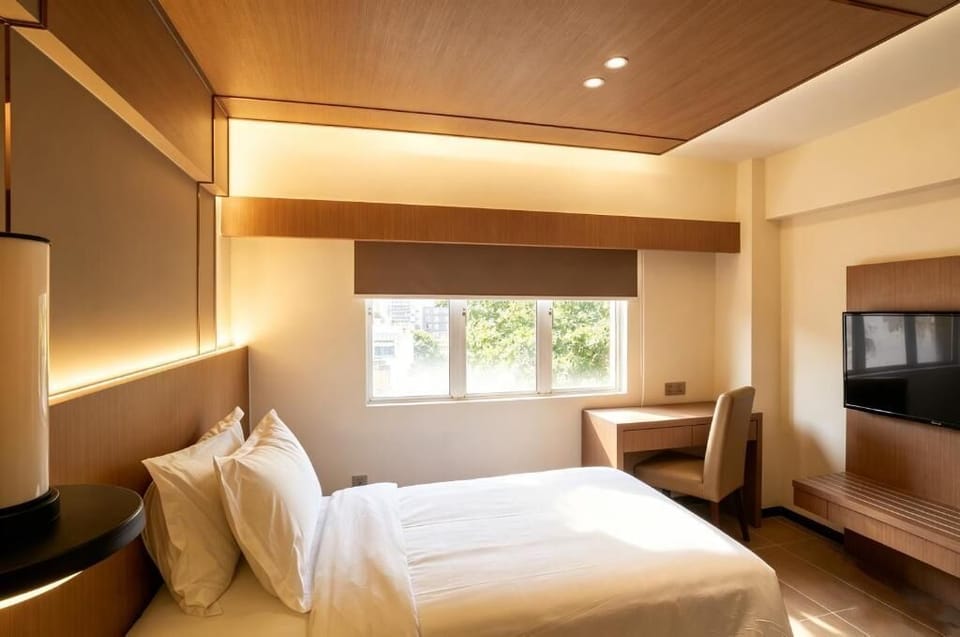 Deluxe Single Room, City View | Blackout drapes, iron/ironing board (on request), WiFi (free)