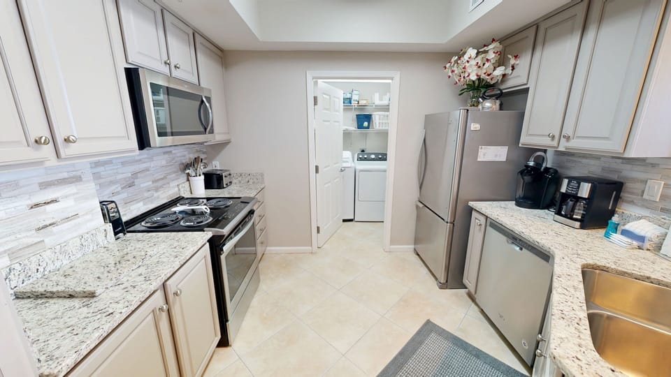 Condo, 2 Bedrooms | Private kitchen | Coffee/tea maker, fridge, oven, toaster