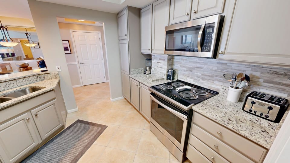 Condo, 2 Bedrooms | Private kitchen | Coffee/tea maker, fridge, oven, toaster