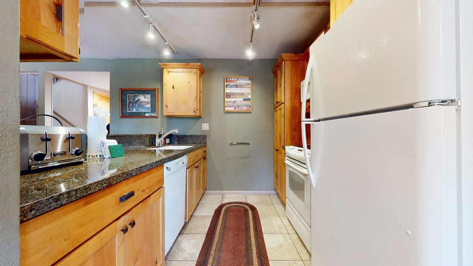 Condo, 2 Bedrooms | Private kitchen | Coffee/tea maker, fridge, oven, toaster