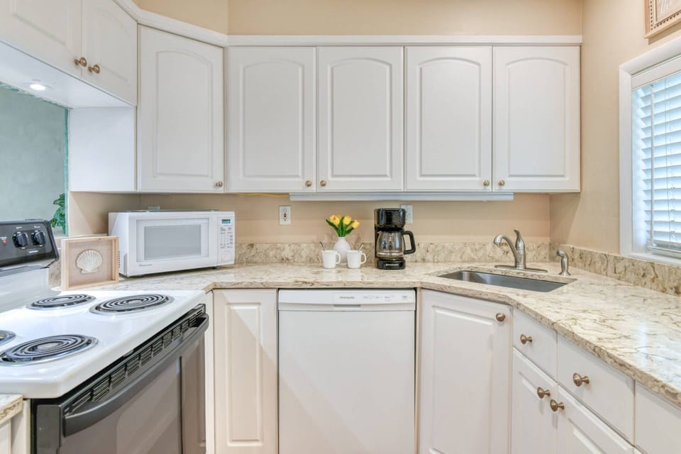 The kitchen is stocked with everything you need to prepare your favorite foods and drinks.