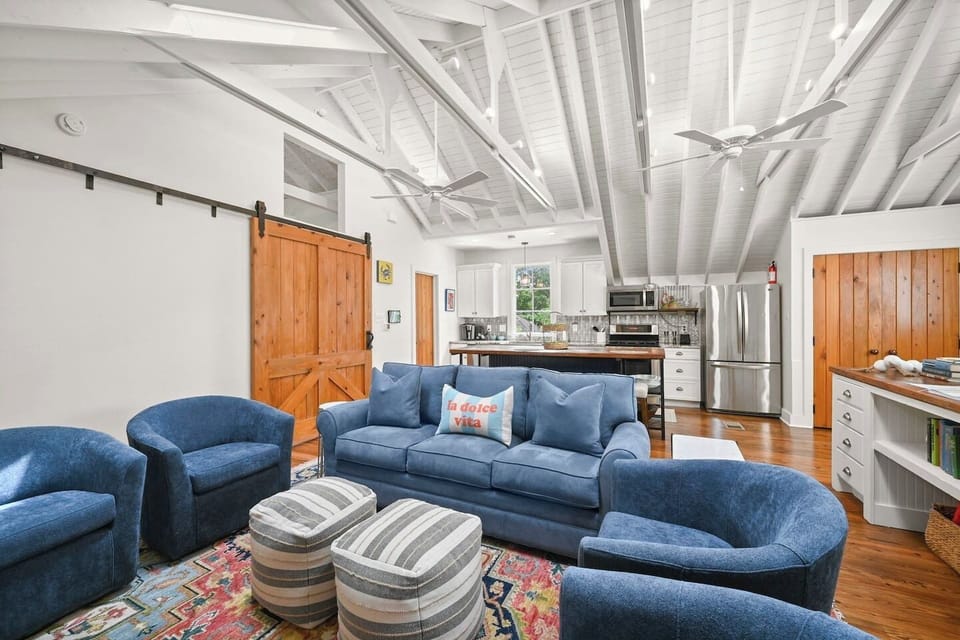 Bright, airy, and designed for gathering — this stylish upstairs retreat is perfect for relaxing with family and friends.