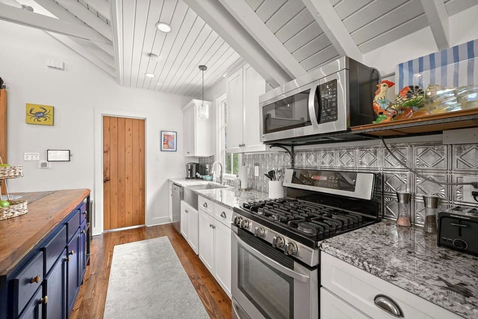 Bright, stylish, and fully stocked for your stay 🍳 This modern kitchen makes cooking at home feel effortless.
