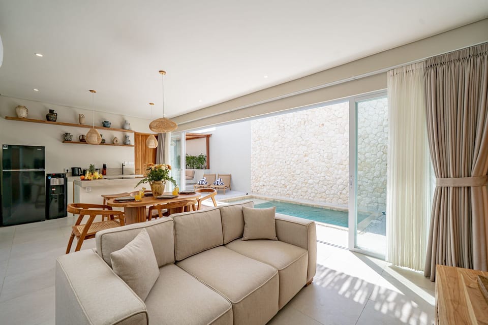 Deluxe Villa, 2 Bedrooms, Patio, Pool View | Living room | 55-inch TV with cable channels