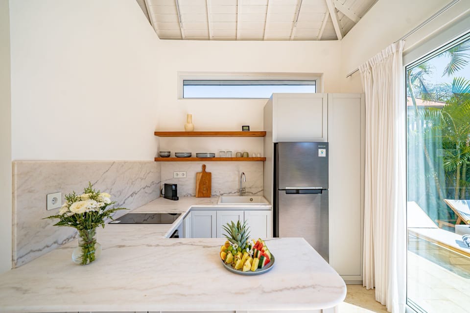 Deluxe Villa, 1 Bedroom, Patio, Pool View | Private kitchen | Coffee/tea maker, fridge, stovetop, electric kettle