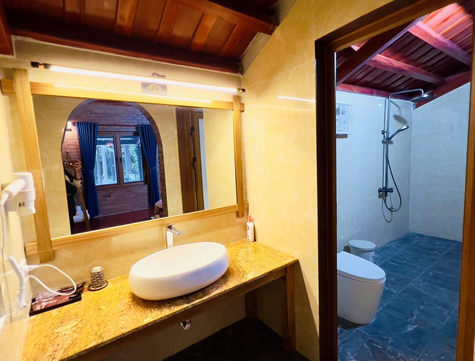 Shower, rainfall showerhead, designer toiletries, hair dryer