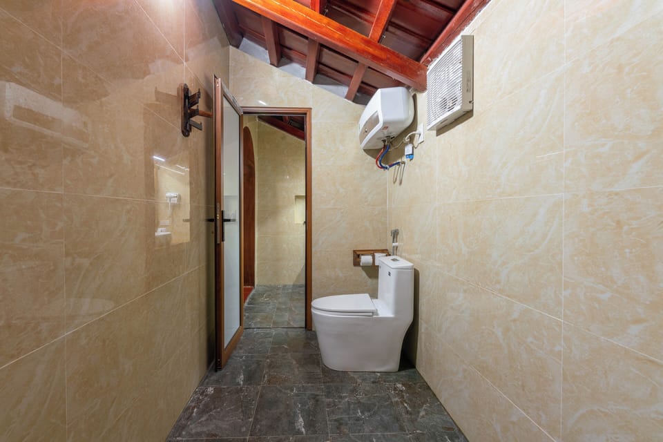 Deluxe Family Bungalow | Bathroom | Shower, rainfall showerhead, designer toiletries, hair dryer