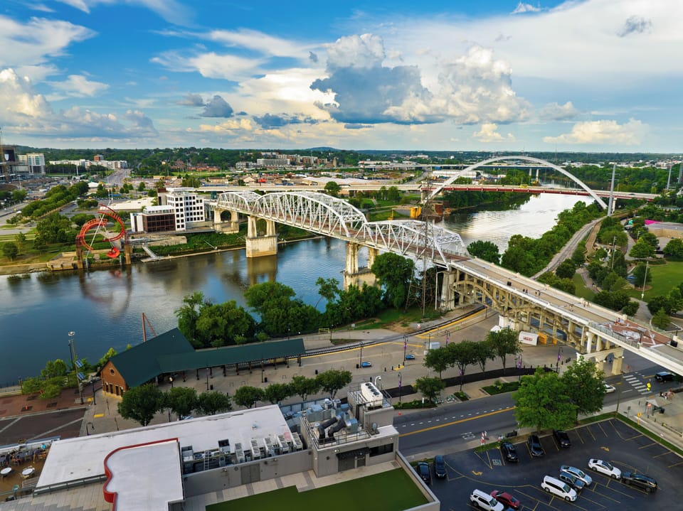 A daytime look over the bustling downtown streets and riverfront.