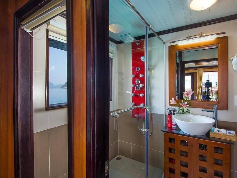 Shower, free toiletries, hair dryer, slippers