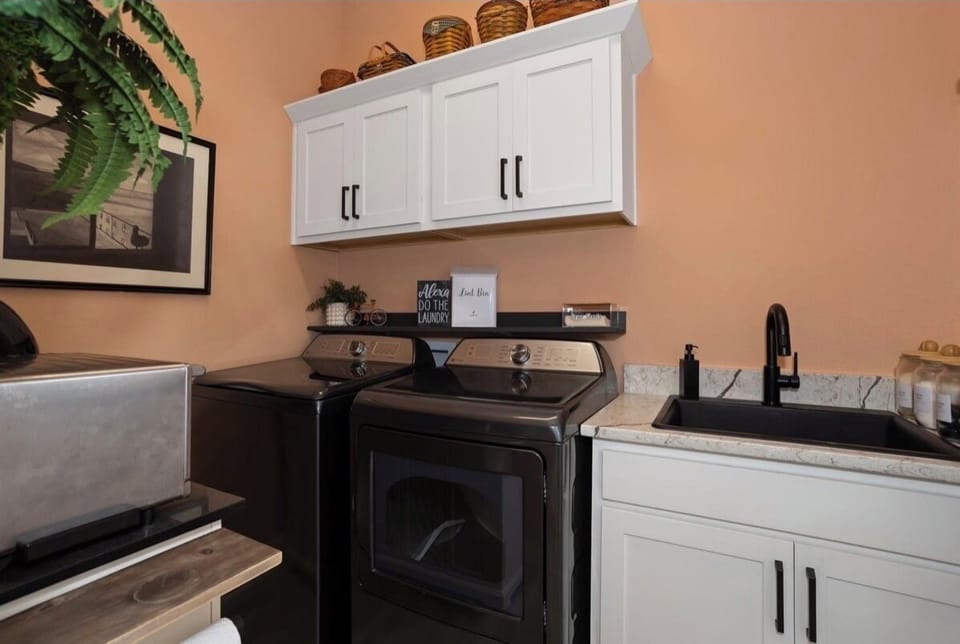 Washer, Dryer & Utility Sink; Complete with Hanging Area for Clothing