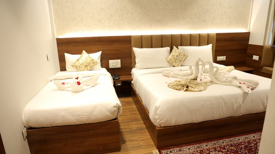 Luxury Triple Room | Premium bedding, minibar, in-room safe, iron/ironing board