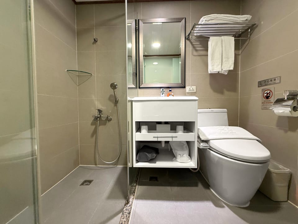 Superior Family Room | Bathroom | Hair dryer, slippers, bidet, towels