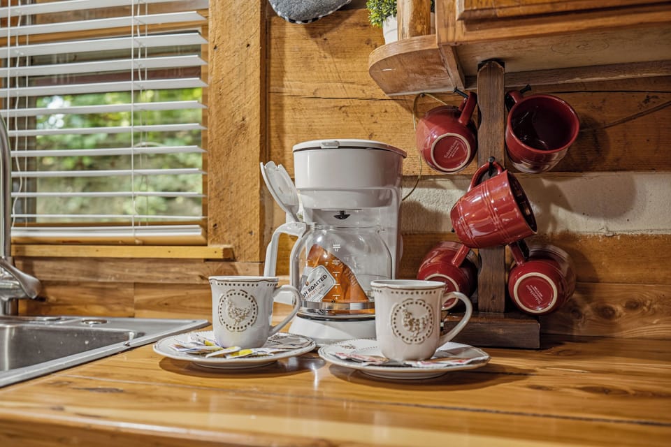 Kitchen includes a coffee pot for easy mornings