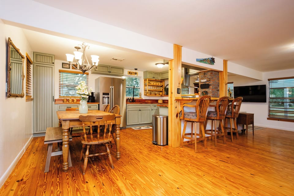 Farmhouse kitchen table and open kitchen bar seating - plenty of room to gather.