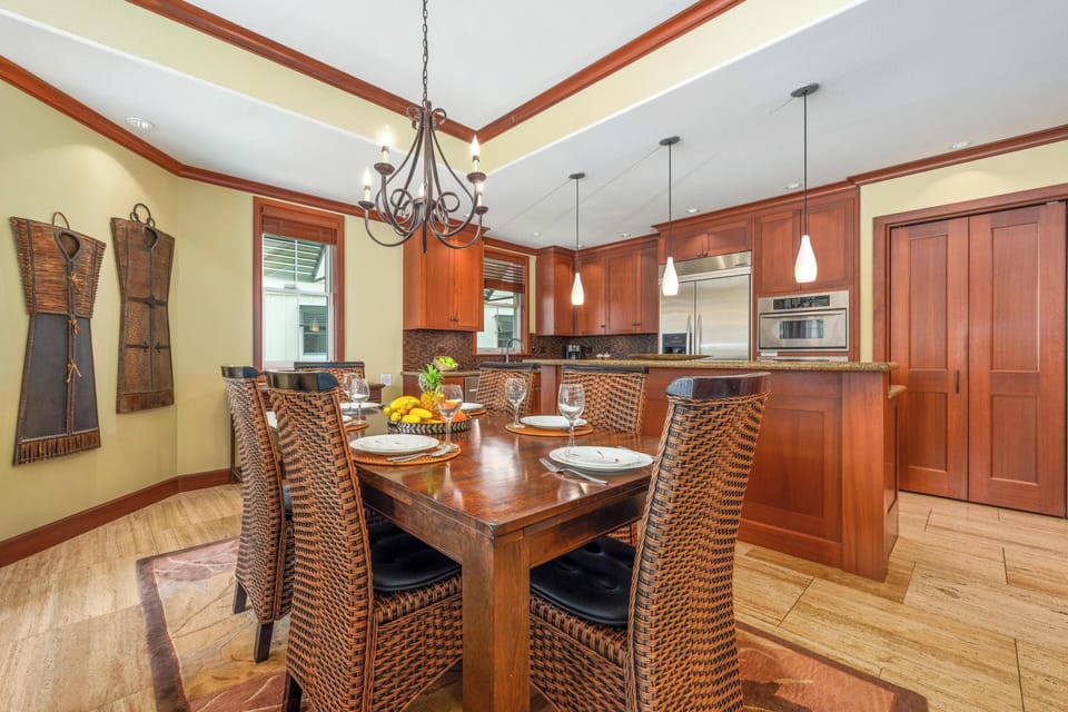 Gather around this beautiful dining table, near the fully equipped gourmet kitchen.