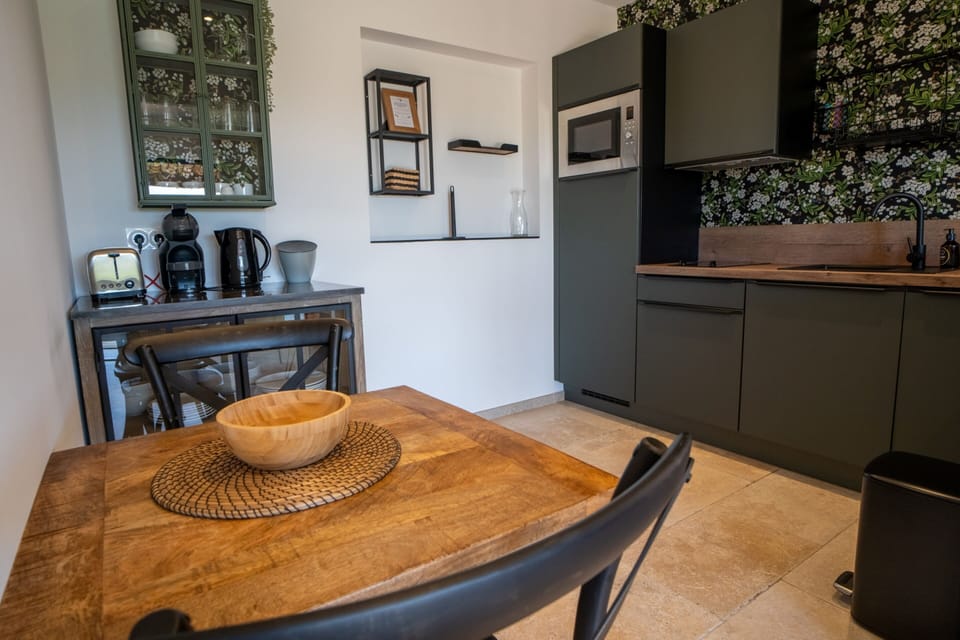 Apartment, 1 Bedroom, Partial Sea View | Private kitchen | Espresso maker, coffee/tea maker, electric kettle, highchair