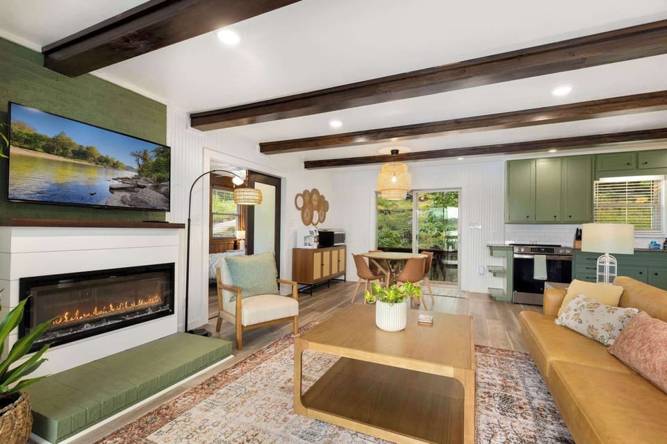 When you first enter our home, you'll be greeted by our open concept living space and kitchen area.