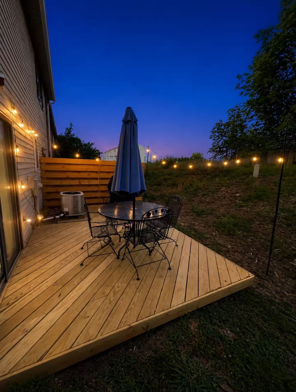 Peaceful backyard deck with grill for morning coffee evening dinner & wine.