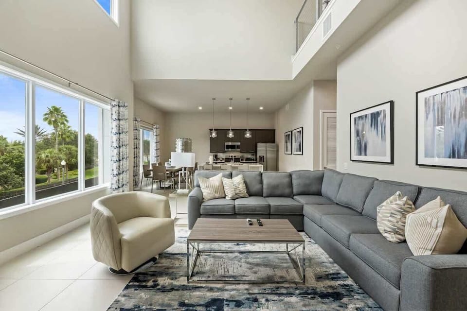 Unit 222 Living Room: Sink into a cloud of comfort on the sprawling sectional, perfect for movie nights with the whole crew.
